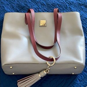 Gray with burgundy handles